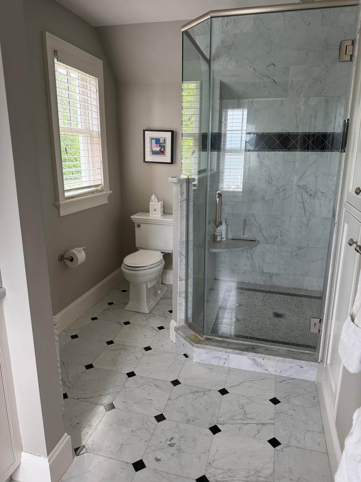 Disinfected and detailed bathroom with glass shower