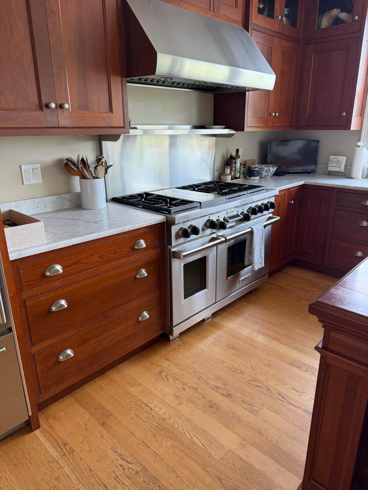 Professionally deep cleaned kitchen range and cabinets